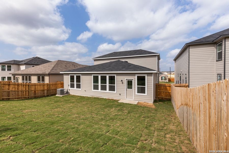 Exterior details and patio area of a home in Hidden Bluffs at TRP, San Antonio (Image 3).