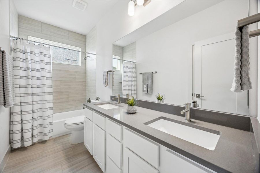 Furnished interior view inside a new home in Chester Ranch Place, Round Rock (Image 9). Furnished interior view inside a new home in Chester Ranch Place, Round Rock (Image 9).