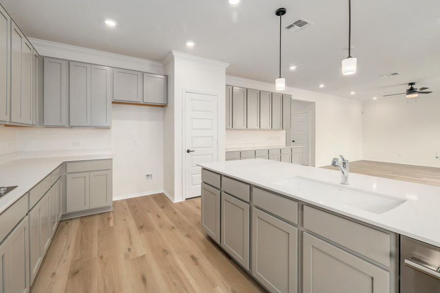 Furnished interior view inside a new home in River Bluff, Leander (Image 7).