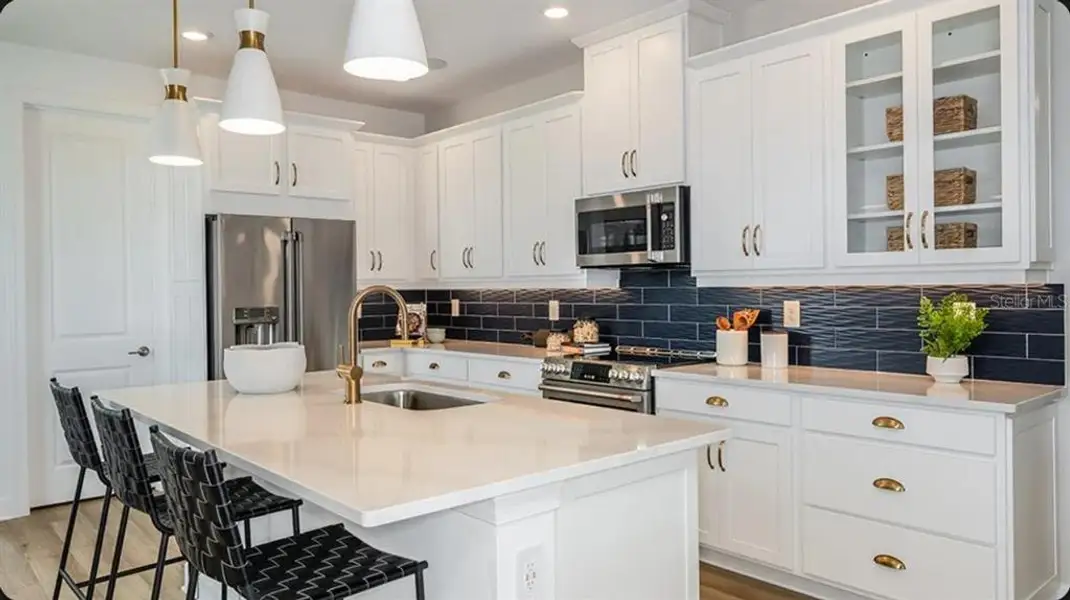 Furnished interior view inside a new home in Westview Community Group Page, Kissimmee (Image 3).