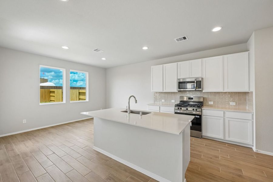 Furnished interior view inside a new home in Azalea, Pattison (Image 7).