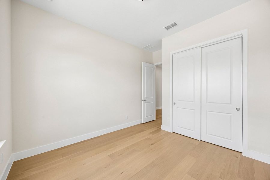 Representative unfurnished interior of a home built from the Mirella by Landon Homes in Fields - East Village, Frisco (Image 25). Representative unfurnished interior of a home built from the Mirella by Landon Homes in Fields - East Village, Frisco (Image 25).