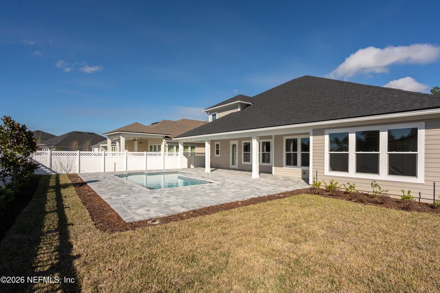Exterior details and patio area of a home in SilverLeaf, St. Augustine (Image 29).