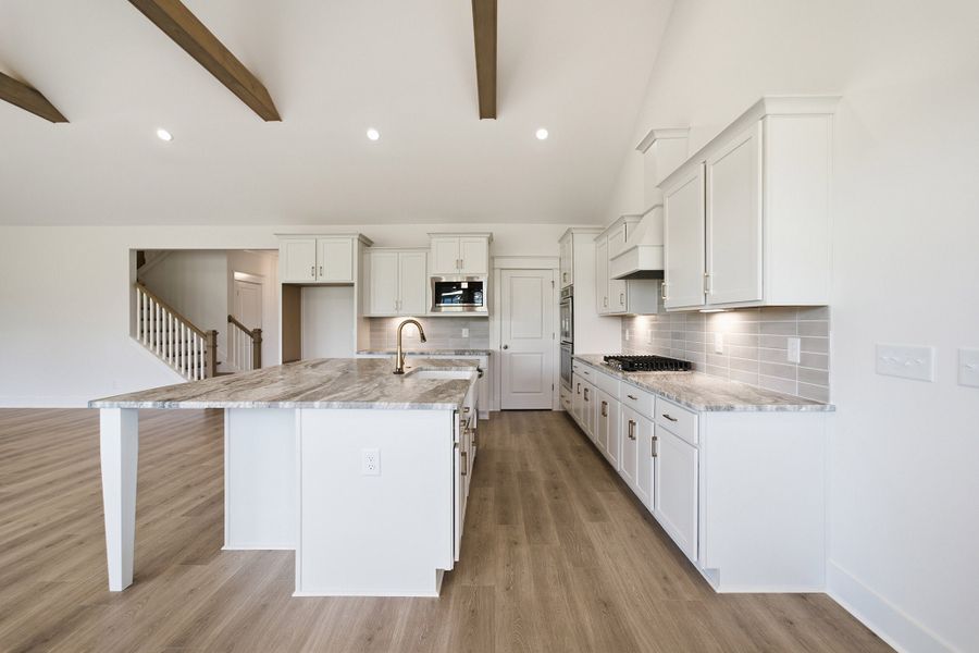 Furnished interior view inside a new home in Aden Woods, Fairview (Image 9).