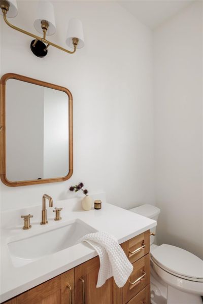 Bathroom with vanity and toilet