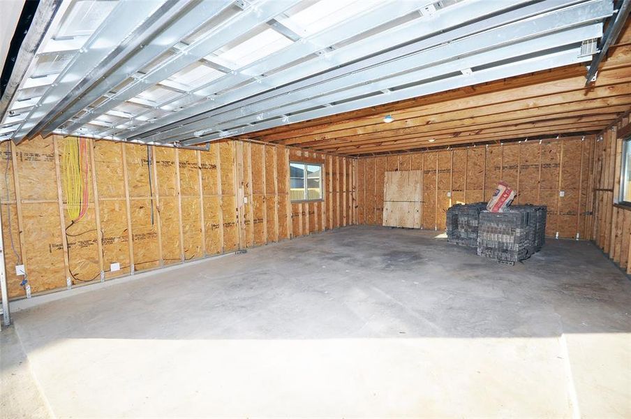 The 25Long garage has space for 2 vehicles with and extra 10 by 20 space at the rear for hobbies.