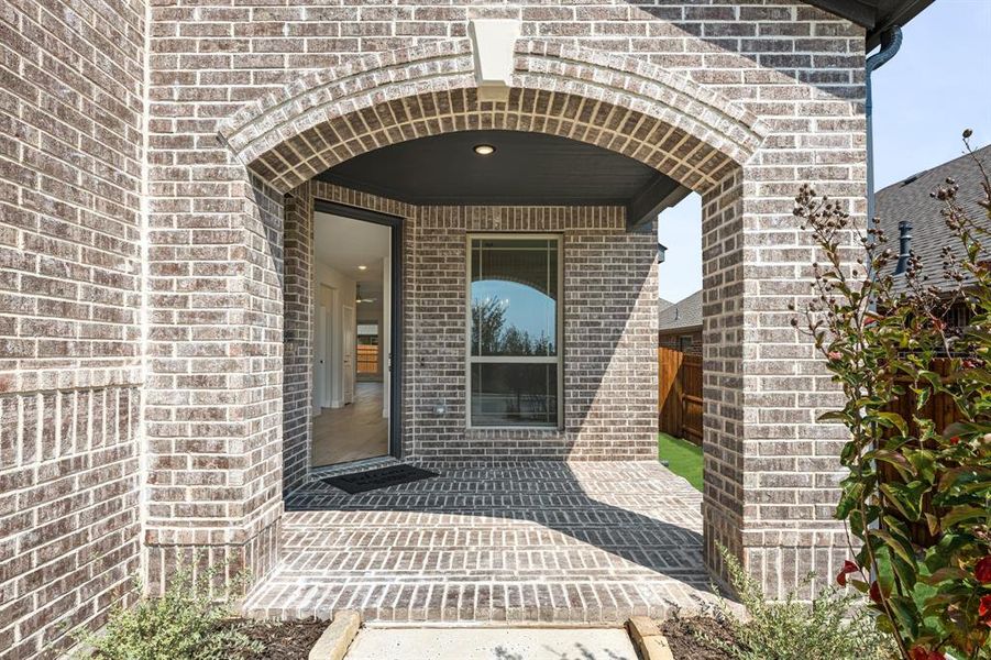 Exterior details and patio area of a home in Country Lakes Classic 60, Argyle (Image 4).