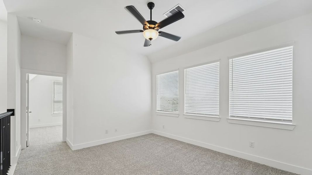 Representative unfurnished interior of a home built from the Cayman by Chesmar Homes in Crescent Bluff, Georgetown (Image 40).