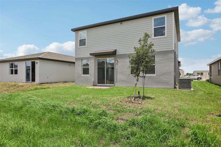 Exterior details and patio area of a home in Villamar - Classic Series, Winter Haven (Image 3).