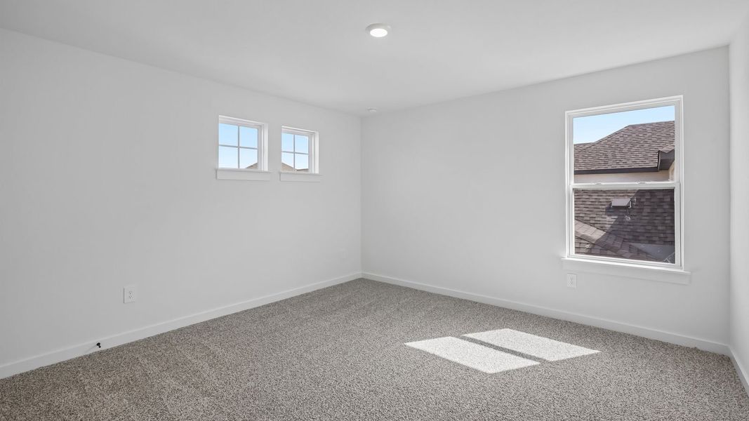 Spacious, unfurnished interior of a new home in Rosenbusch Ranch, Leander (Image 51).