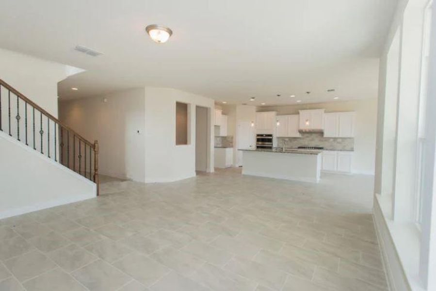 Photo of Pulte home with same floor plan, not of actual home listed.