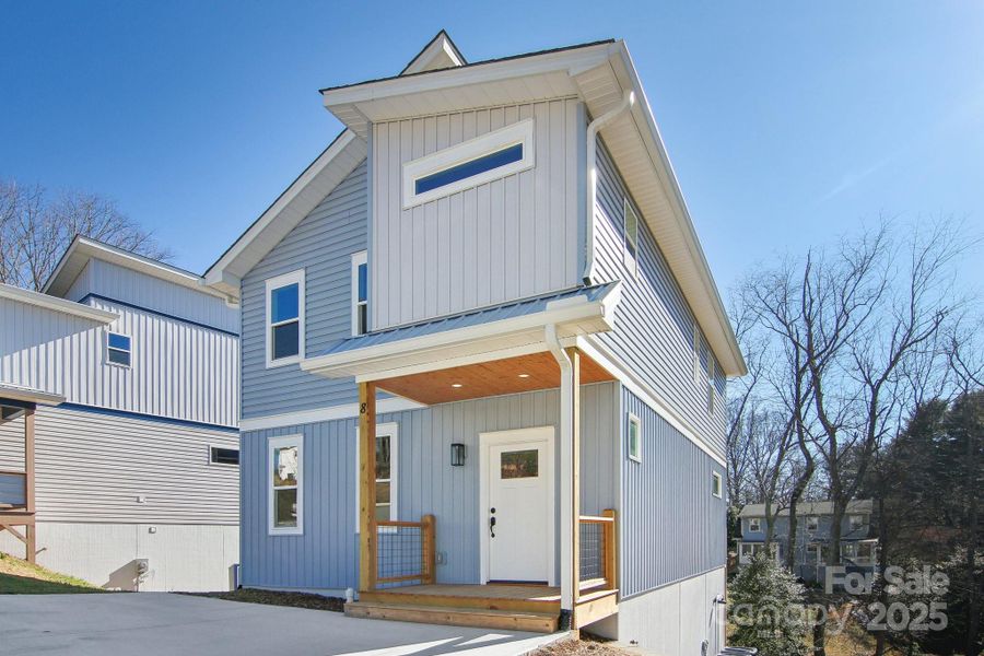 Front exterior of a new home in , Asheville, NC, highlighting curb appeal (Image 2).