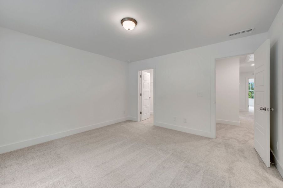 Spacious, unfurnished interior of a new home in Ashmore Townes, Garner (Image 25). Spacious, unfurnished interior of a new home in Ashmore Townes, Garner (Image 25).