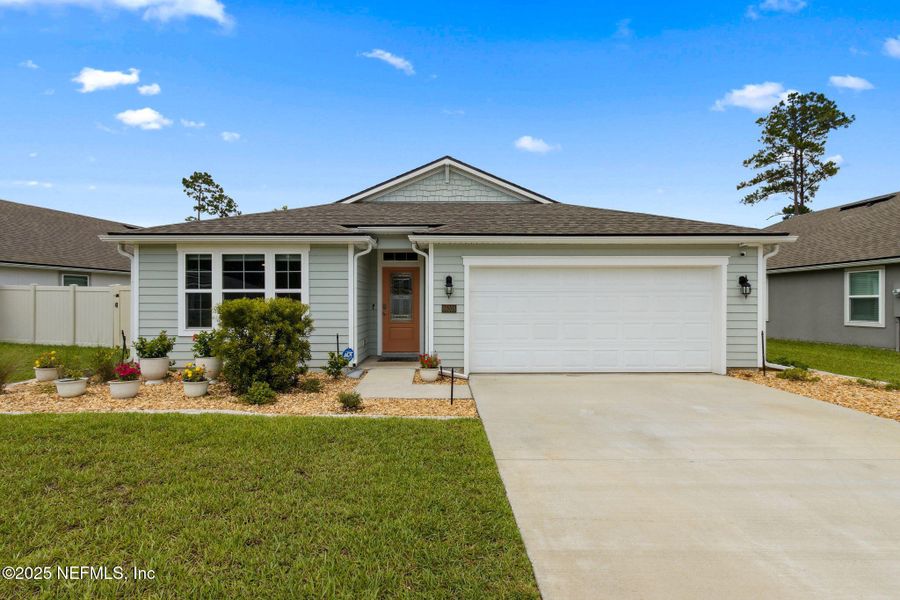 Front exterior of a new home in River Glen, Yulee, FL, highlighting curb appeal (Image 1). Front exterior of a new home in River Glen, Yulee, FL, highlighting curb appeal (Image 1).