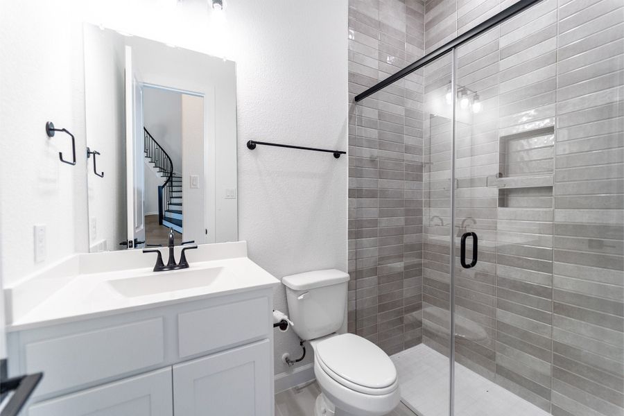 Furnished interior view inside a new home in Green Meadows, Celina (Image 11).