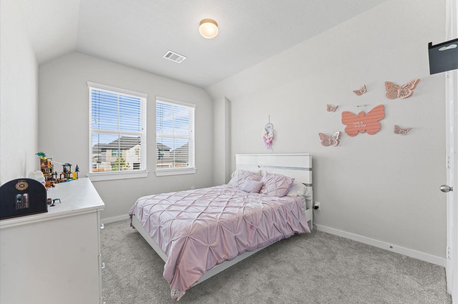 One of the secondary bedrooms upstairs, with an en suite bathroom. One of the secondary bedrooms upstairs, with an en suite bathroom.