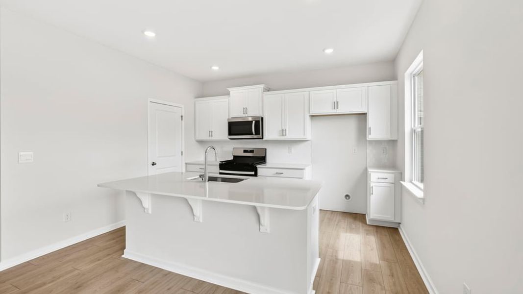 Furnished interior view inside a new home in Durbin Meadows Traditions, Fountain Inn (Image 9).