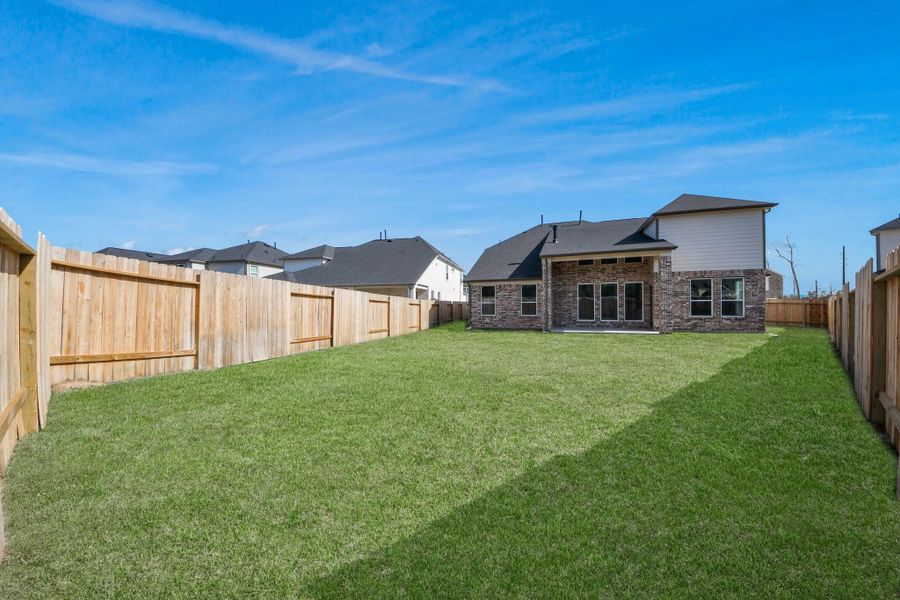 Explore the expansive backyard with its inviting covered patio—a perfect blend of space for the kids to play and adults to unwind. Ideal for creating your outdoor oasis, this backyard accommodates patio furniture, a BBQ pit, and endless possibilities for leisure and entertainment.