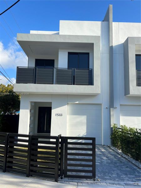 Front exterior of a new home in , Miami, FL, highlighting curb appeal (Image 2). Front exterior of a new home in , Miami, FL, highlighting curb appeal (Image 2).