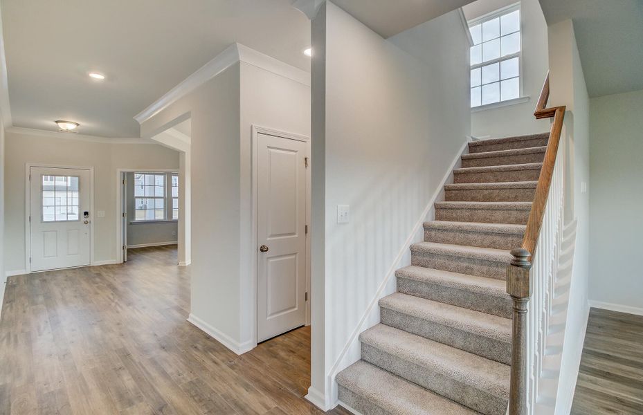Spacious, unfurnished interior of a new home in Sweetgrass at Summers Corner, Summerville (Image 11).
