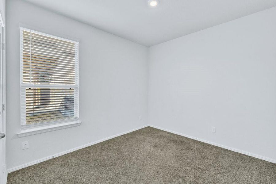 Secondary bedroom at the front of the house Secondary bedroom at the front of the house
