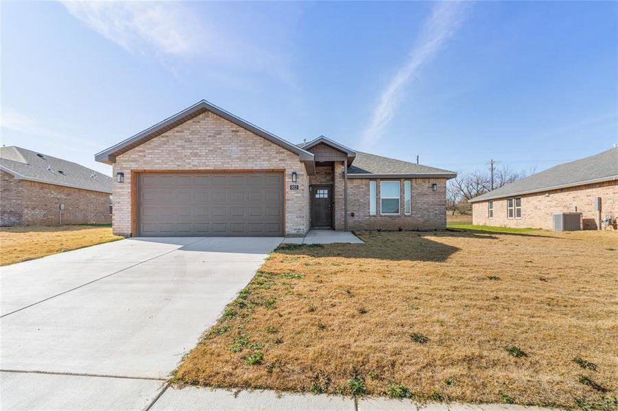 Front exterior of a new home in , Coleman, TX, highlighting curb appeal (Image 16).