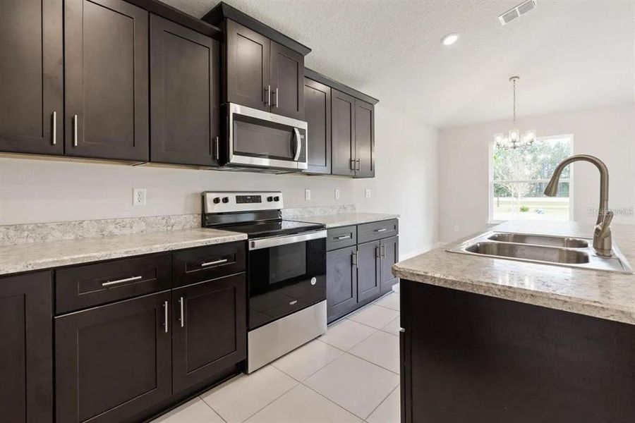 Furnished interior view inside a new home in Palm Coast, Palm Coast (Image 5). Furnished interior view inside a new home in Palm Coast, Palm Coast (Image 5).