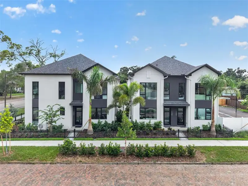 Front exterior of a new home in , St. Petersburg, FL, highlighting curb appeal (Image 16). Front exterior of a new home in , St. Petersburg, FL, highlighting curb appeal (Image 16).