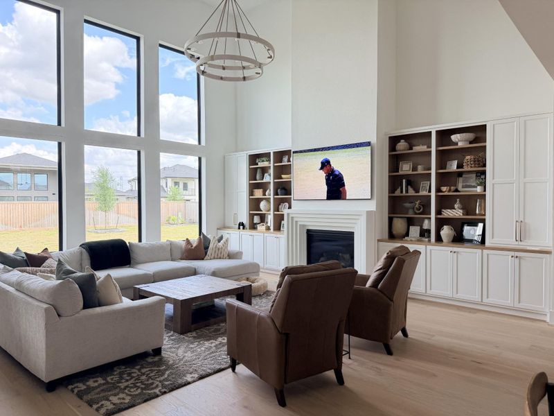Large windows and high ceilings in the family room. Representative image. Large windows and high ceilings in the family room. Representative image.