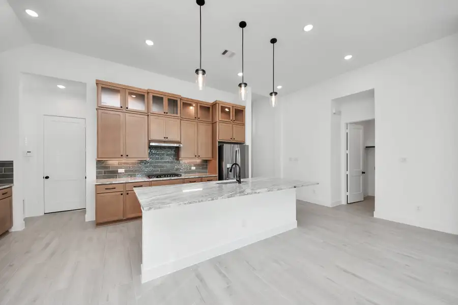 Furnished interior view inside a new home in Beacon Point, Texas City (Image 9).