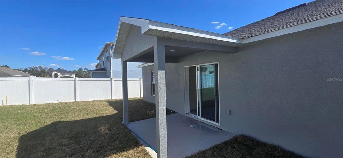 Exterior details and patio area of a home in , Poinciana (Image 3). Exterior details and patio area of a home in , Poinciana (Image 3).
