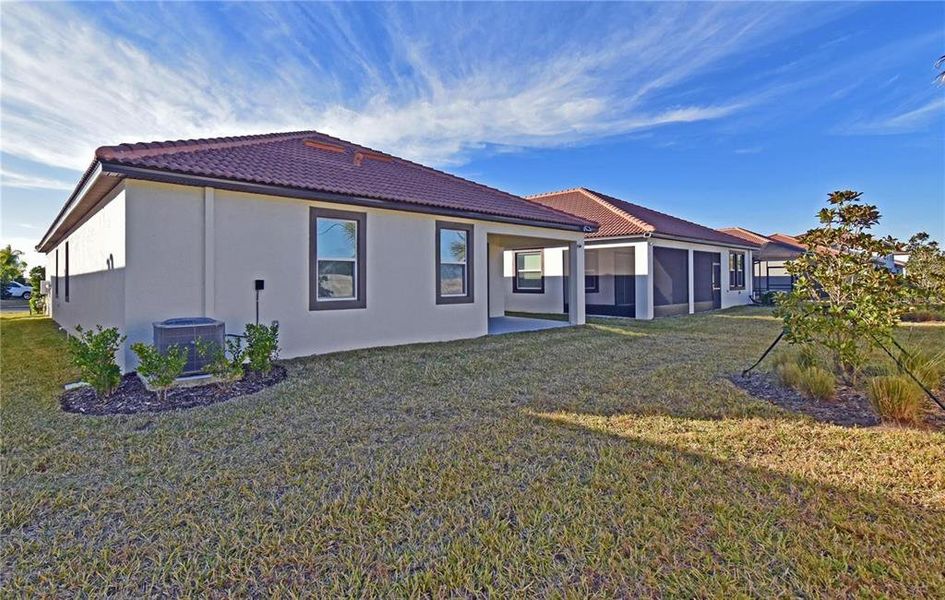 Exterior details and patio area of a home in Southshore Bay Active Adult, Wimauma (Image 29).