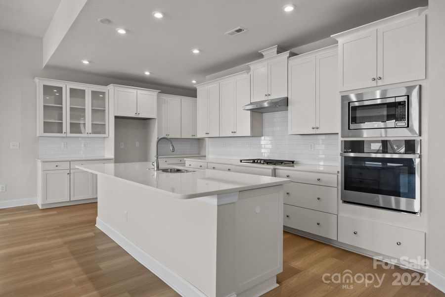 This light and bright gourmet Kitchen is the center of this home that is perfect for entertaining.