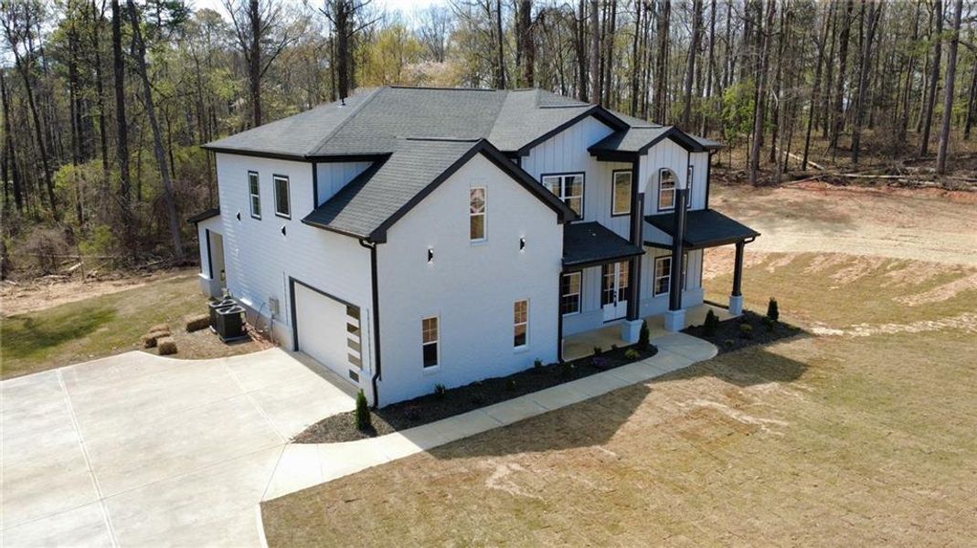 Front exterior of a new home in , Snellville, GA, highlighting curb appeal (Image 28).