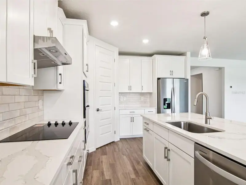 Furnished interior view inside a new home in Two Rivers - Signature Series, Zephyrhills (Image 3).