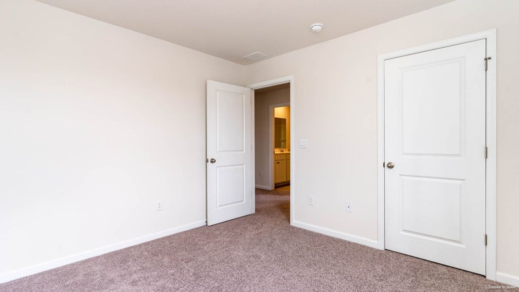 Spacious, unfurnished interior of a new home in Indigo Preserve, Leland (Image 14).