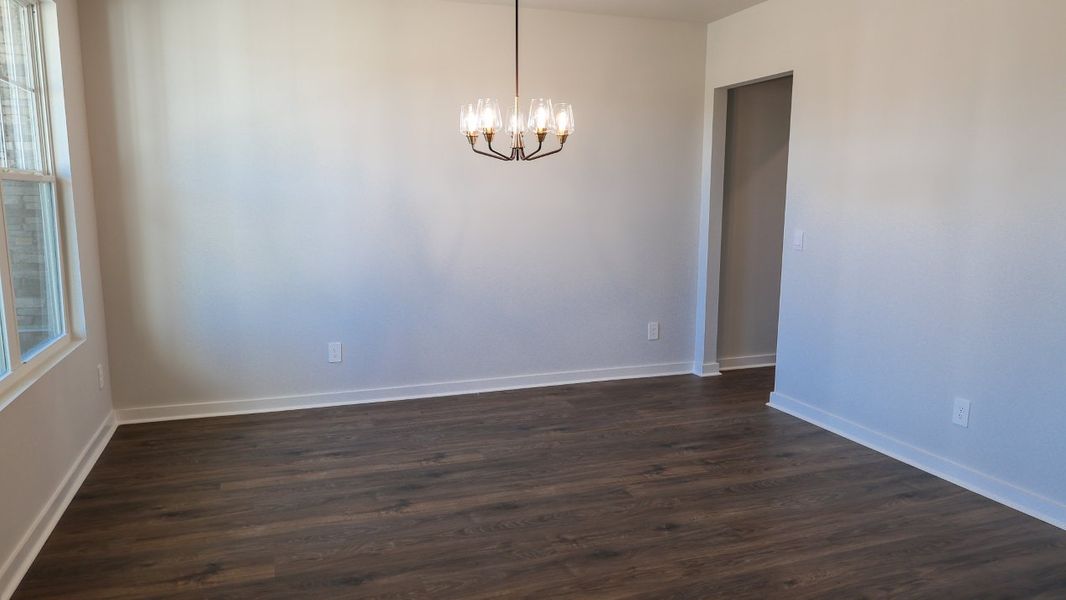 Representative unfurnished interior of a home built from the TISDALE by D.R. Horton in Harvest Point, Spring Hill (Image 22).