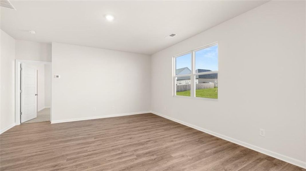 Spacious, unfurnished interior of a new home in The Preserve at Agricultural Village, Perry (Image 34).