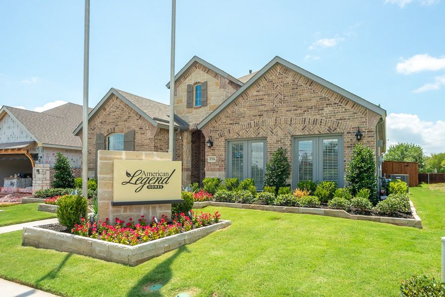 Front exterior of a new home in Wildridge, Oak Point, TX, highlighting curb appeal (Image 22).