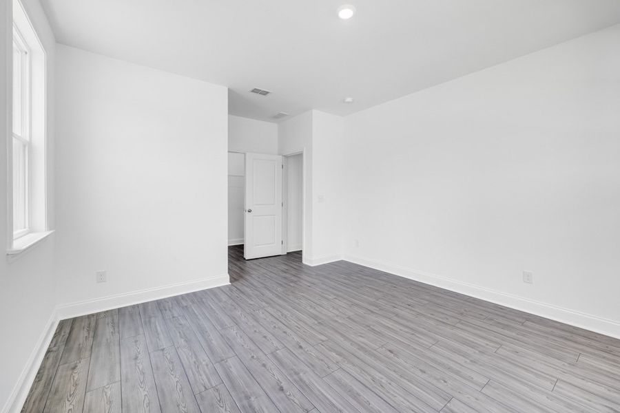 Representative unfurnished interior of a home built from the Trenton by Taylor Morrison in Bennett Farm, Loganville (Image 13).