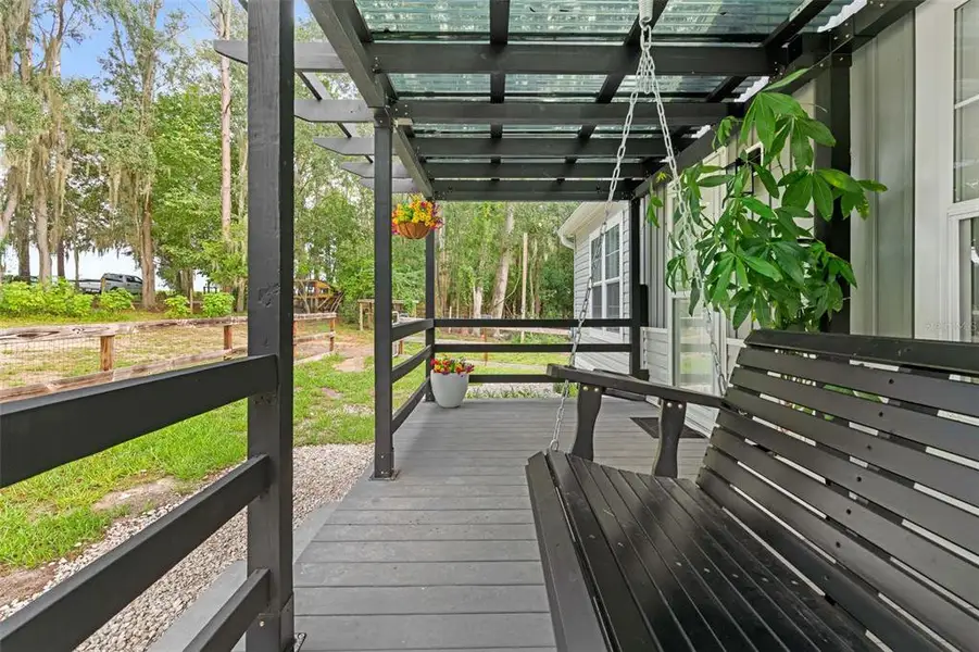 Exterior details and patio area of a home in , Brooksville (Image 3).