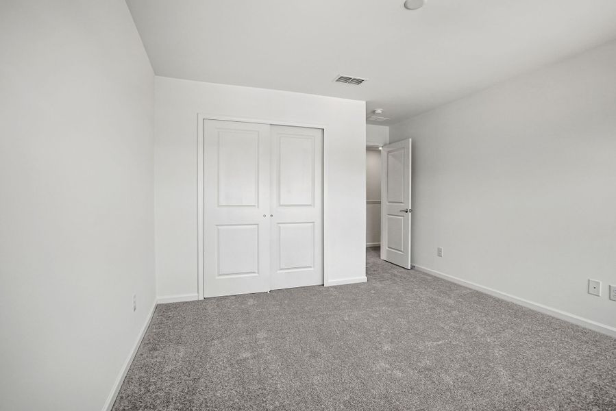 Spacious, unfurnished interior of a new home in Michaux Gardens, Belmont (Image 50).