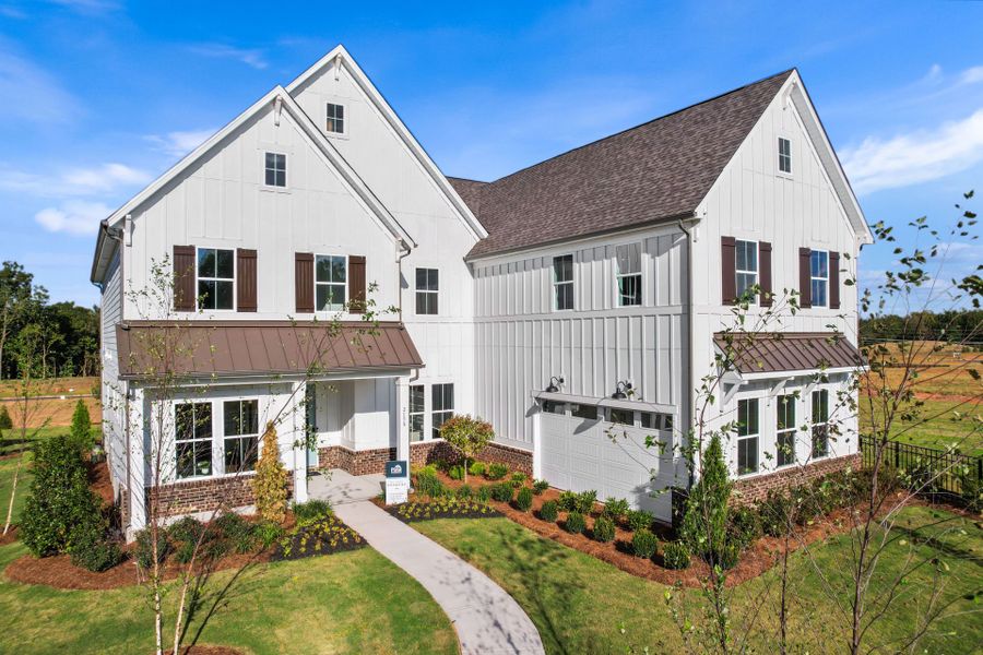 Representative exterior photo of a completed home built from the Stonegate by Pulte Homes in The Retreat at Carolina Ridge, Harrisburg, NC (Image 32). Representative exterior photo of a completed home built from the Stonegate by Pulte Homes in The Retreat at Carolina Ridge, Harrisburg, NC (Image 32).