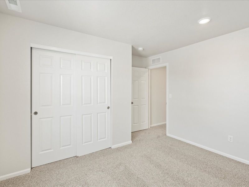 Spacious, unfurnished interior of a new home in Frontier Estates - The Flora Collection, Firestone (Image 15). Spacious, unfurnished interior of a new home in Frontier Estates - The Flora Collection, Firestone (Image 15).
