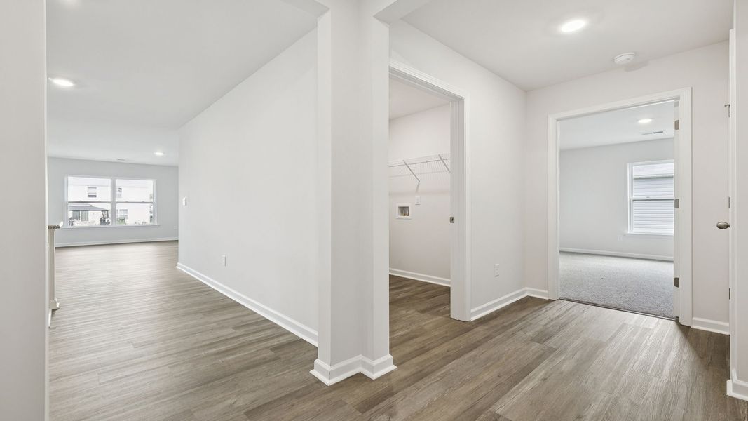 Spacious, unfurnished interior of a new home in Bentley Park, Greenwood (Image 13).