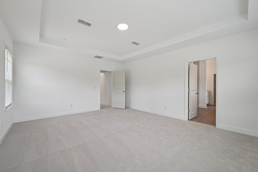Representative unfurnished interior of a home built from the Jordan by Ashton Woods in Rowland's Grant, Fuquay Varina (Image 40).