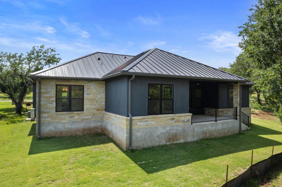 Front exterior of a new home in , Horseshoe Bay, TX, highlighting curb appeal (Image 17).