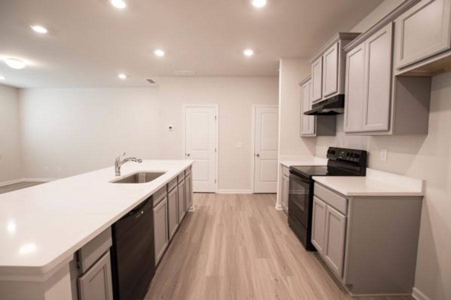 Representative furnished interior of a home built from the Rutherford by Piedmont Residential in Owen Preserve, Canton (Image 6).