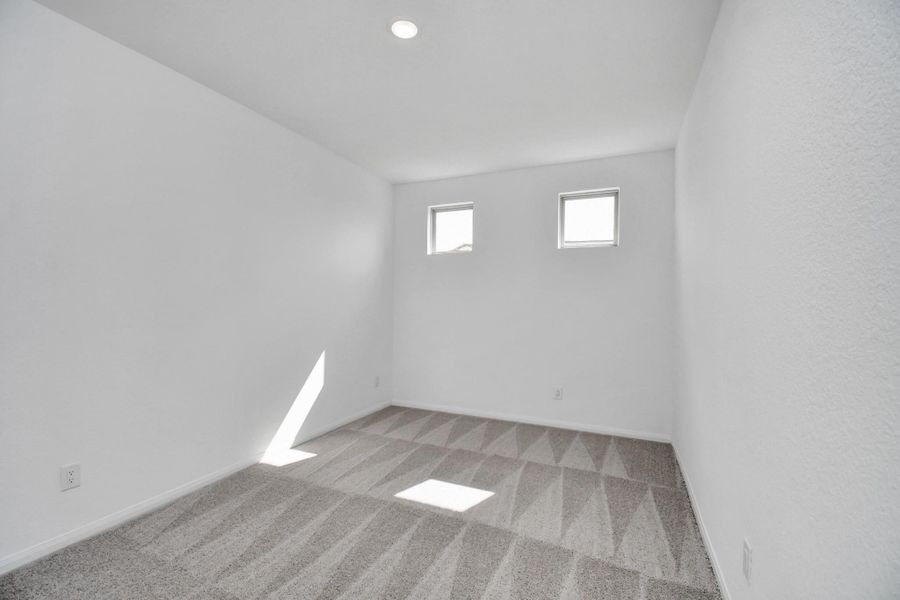 Spacious, unfurnished interior of a new home in 50' Traditional Homes at Elyson, Katy (Image 34).