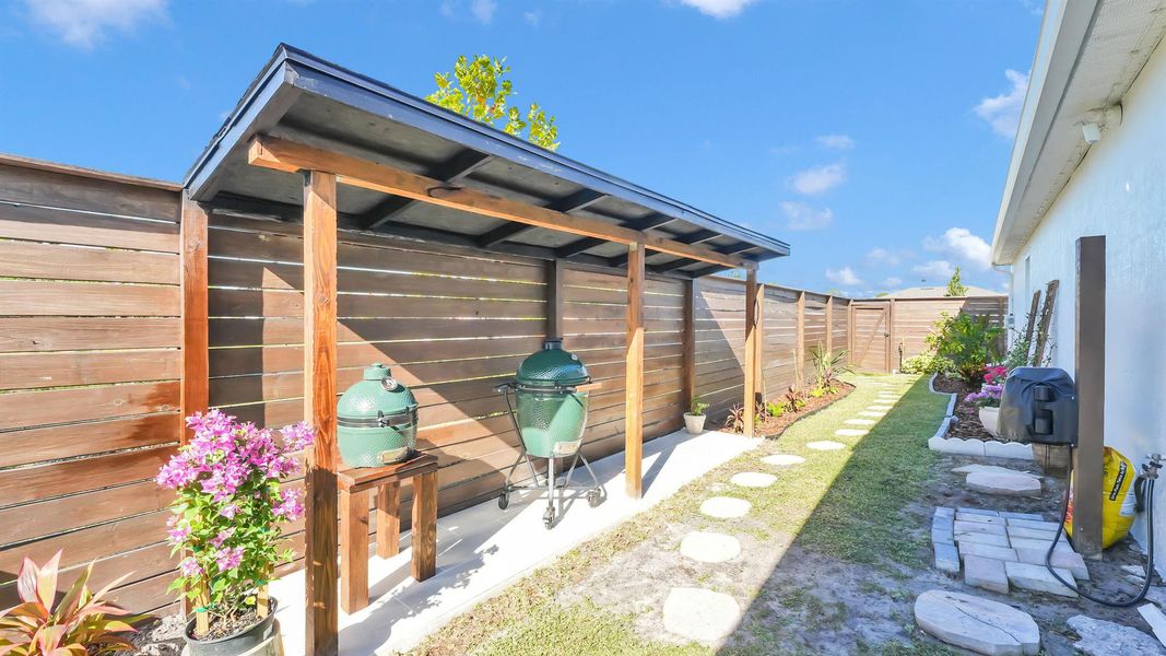 Exterior details and patio area of a home in , Port St. Lucie (Image 32). Exterior details and patio area of a home in , Port St. Lucie (Image 32).